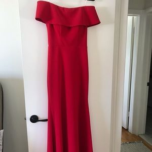 Betsy Adam red off-shoulder dress.